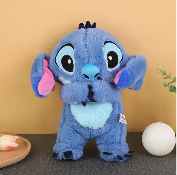Les peluches Stitch pour le soulagement de l'anxiété & oursons en peluche avec détails sensoriels, musique, lumières et mouvement de respiration rythmique.